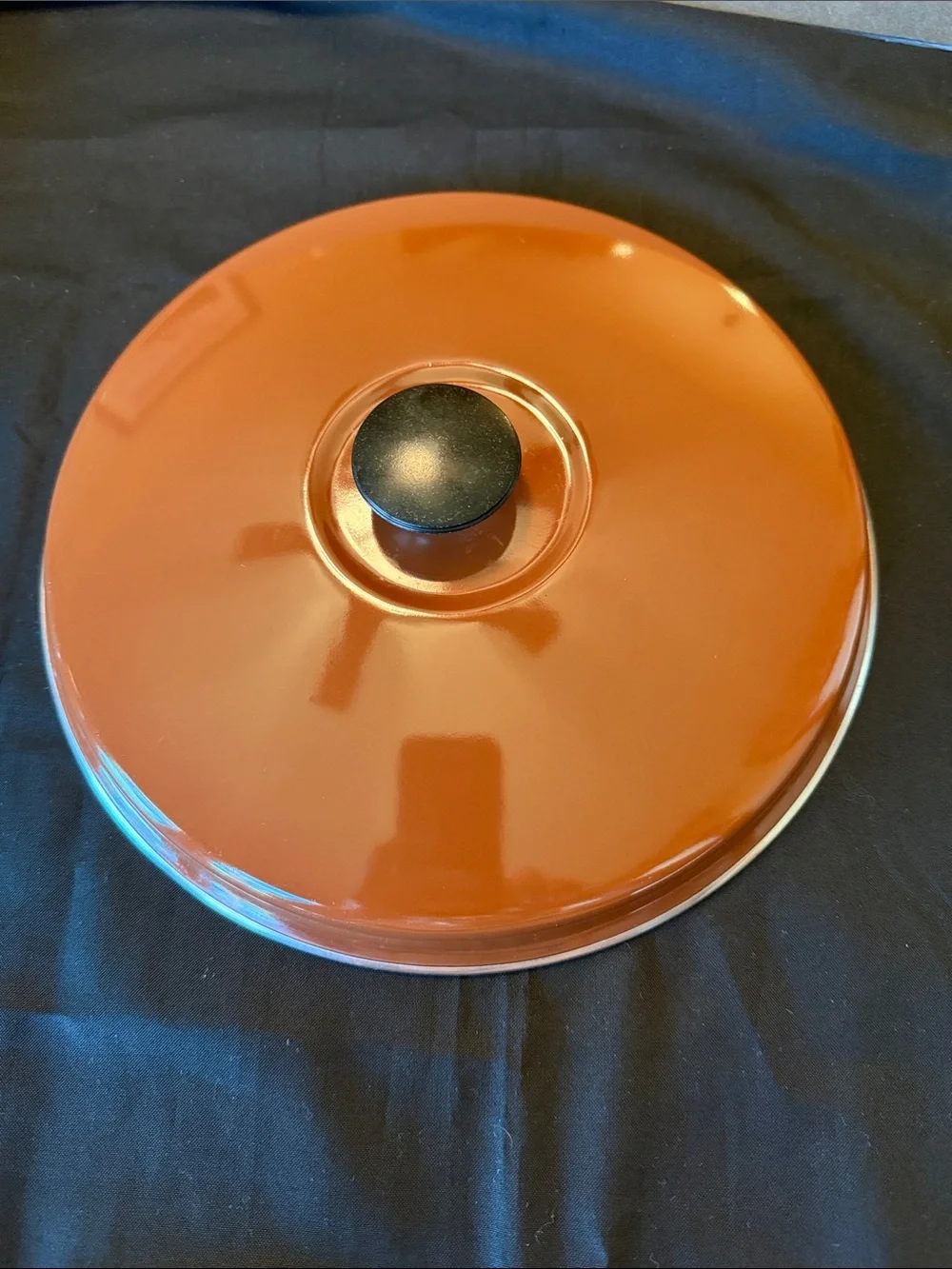 1970s enamelware skillet  featuring a retro “Spice of Life” motif.